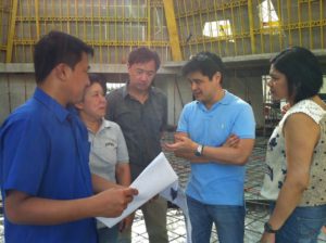 The stained glass window designer, Carlo Tanseco, at work in the construction sight of the chapel.