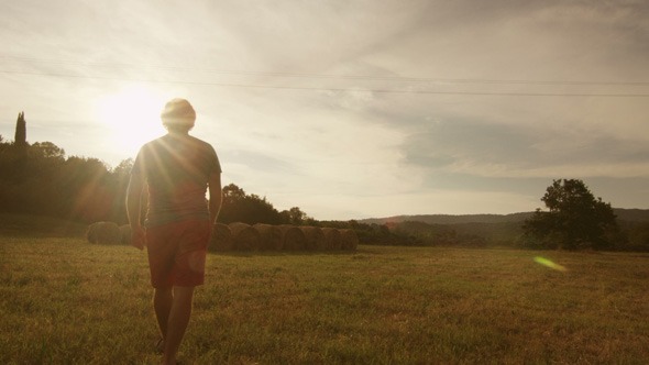 Man_Walking_and_Streching_in_Nature_1_590